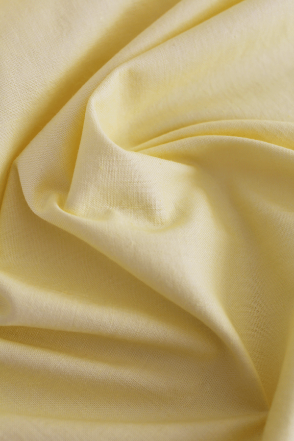Algodón amarillo suave